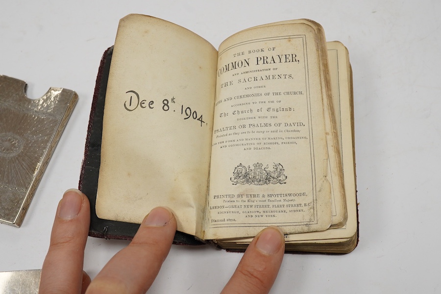 Assorted small silver including an Edwardian inset Scottish hardstone pill box, William Henry Johnson, Birmingham, 1902, 36mm, a mounted prayer book, a card case, cased comb and a plated snuff box. Condition - poor to fa